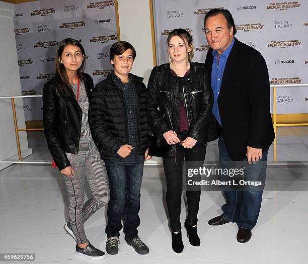 Jamison Bess Belushi and actor Jim Belushi arrive for the Premiere Of Lionsgate's "The Hunger Games: Mockingjay - Part 1" - Arrivals held at Nokia...