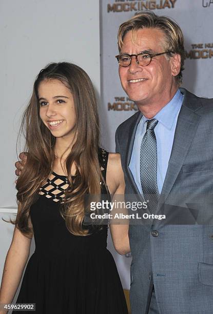 Writer/producer Aaron Sorkin with daughter arrive for the Premiere Of Lionsgate's "The Hunger Games: Mockingjay - Part 1" - Arrivals held at Nokia...