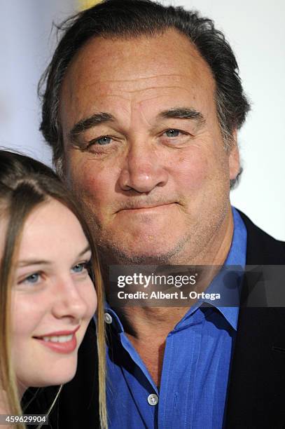Actor Jim Belushi and daughter Jamison arrive for the Premiere Of Lionsgate's "The Hunger Games: Mockingjay - Part 1" - Arrivals held at Nokia...