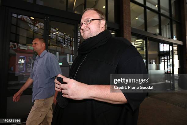 Internet Party Founder Kim Dotcom leaves Auckland District Court where he was appearing a bail hearing on November 27, 2014 in Auckland, New Zealand....