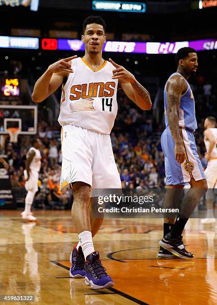 Gerald Green of the Phoenix Suns reacts after a slam dunk against the Denver Nuggets during the second half of the NBA game at US Airways Center on...