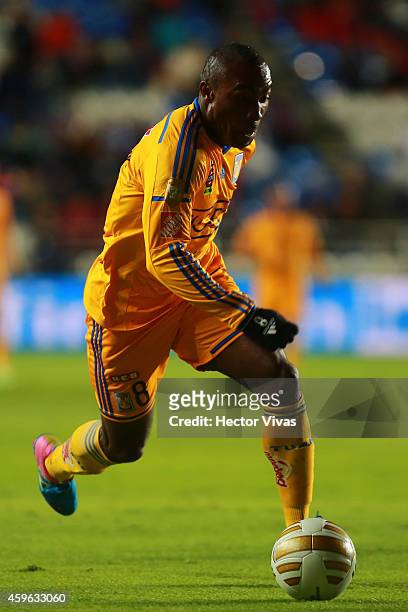 Jose Francisco Torres of Tigres drives the ball during a quarterfinal first leg match between Pachuca and Tigres as part of the Apertura 2014 Liga MX...