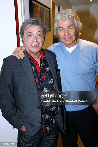 Singers Herve Vilard and Daniel Guichard attend the 'Vivement Dimanche' French TV Show at Pavillon Gabriel on November 26, 2014 in Paris, France.