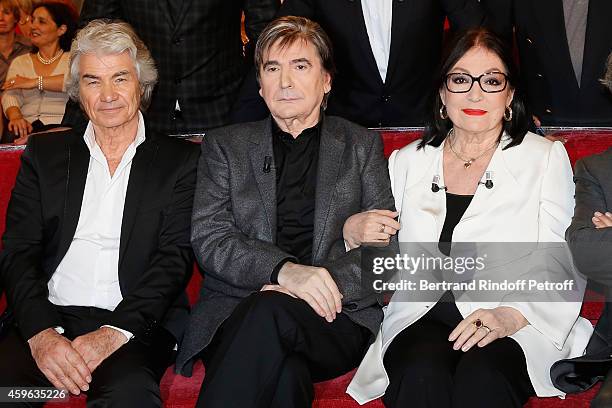 Daniel Guichard, Serge Lama and Nana Mouskouri attend the 'Vivement Dimanche' French TV Show at Pavillon Gabriel on November 26, 2014 in Paris,...