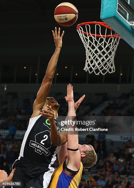 Stephen Dennis of Melbourne United shoots during the round eight NBL match between Melbourne United and Adelaide 36ers at Hisense Arena on November...