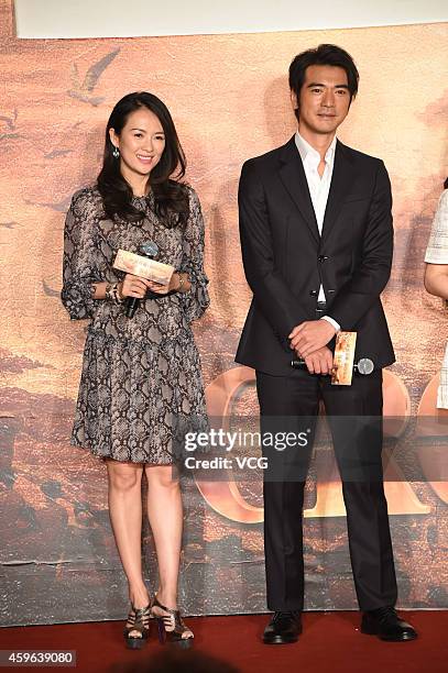 Actress Zhang Ziyi and actor Takeshi Kaneshiro attend press conference for movie "The Crossing" on November 27, 2014 in Beijing, China.