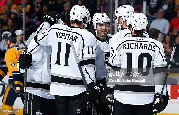 The Los Angeles Kings celebrates the goal of Anze Kopitar against the Nashville Predators at Bridgestone Arena on December 28, 2013 in Nashville,...