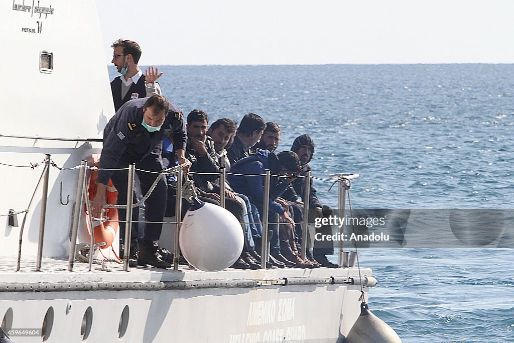 Migrants are taken to Athens' Ierapetra Sports Hall