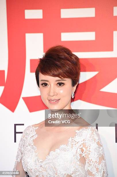 Actress Jin Qiaoqiao attends red carpet activity of BAZAAR Men Style People Of The Year Award Ceremony 2014 on November 27, 2014 in Beijing, China.