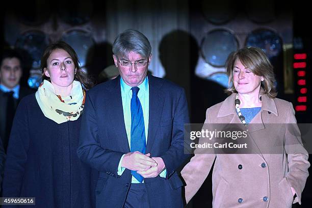 Andrew Mitchell , his wife Dr Sharon Bennett and a woman believed to be his daughter leave the High Court on November 27, 2014 in London, England. A...