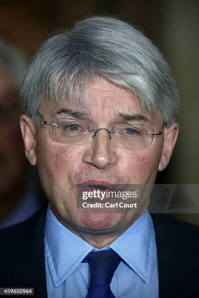 Andrew Mitchell speaks to the media outside the High Court on November 27, 2014 in London, England. A judge has ruled that Andrew Mitchell probably...