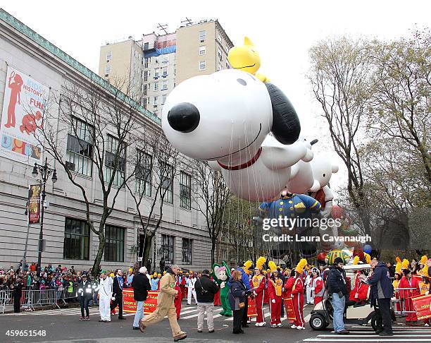 The Snoopy balloon floats in the 88th Annual Macy's Thanksgiving Day Parade on November 27, 2014 in New York City.