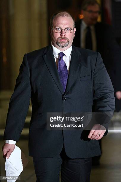 Toby Rowland speaks to the media outside the High Court on November 27, 2014 in London, England. A judge has ruled that Andrew Mitchell probably did...