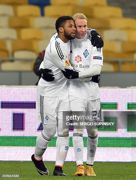 Jeremain Lens of FC Dynamo Kiev is congratulated by his teammate Domagoj Vida after scoring a goal on November 27, 2014 during the UEFA Europa League...