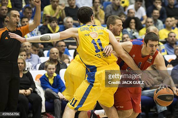Russian CSKA Moscow French guard Nando De Colo vies for the ball against Israel Maccabi Electra Tel Aviv's Israeli center Jake Cohen during their...