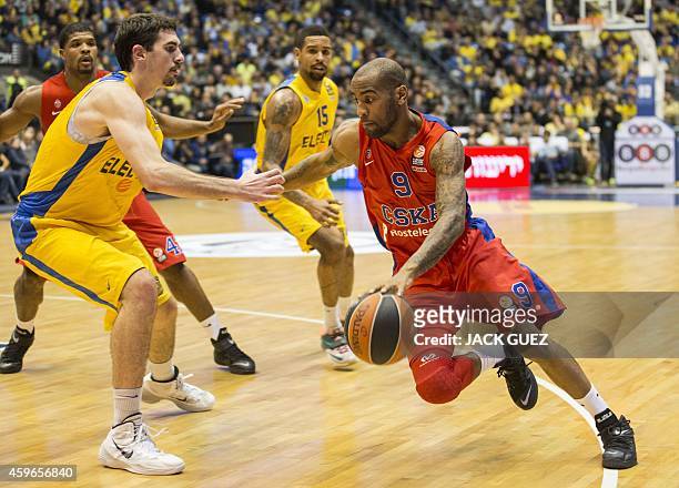 Russian CSKA Moscow's US guard Aaron Jackson vies for the ball against Israel Maccabi Electra Tel Aviv's Israeli centre Jake Cohen during their...