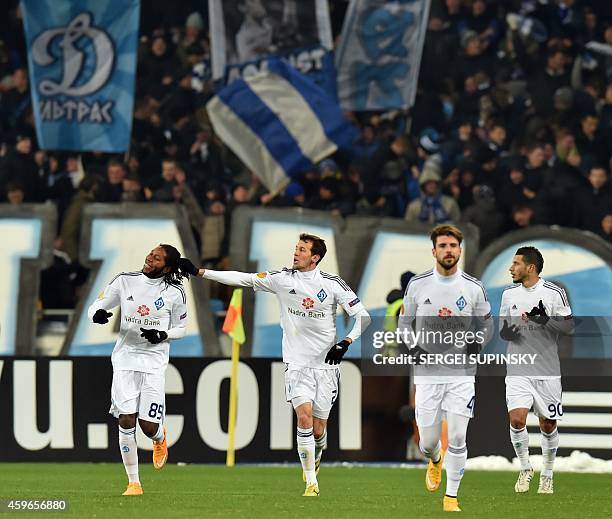 Kiev's players celebrate a goal on November 27, 2014 during the UEFA Europa League group J football match Dynamo Kiev vs Rio Ave FC in Kiev. AFP...