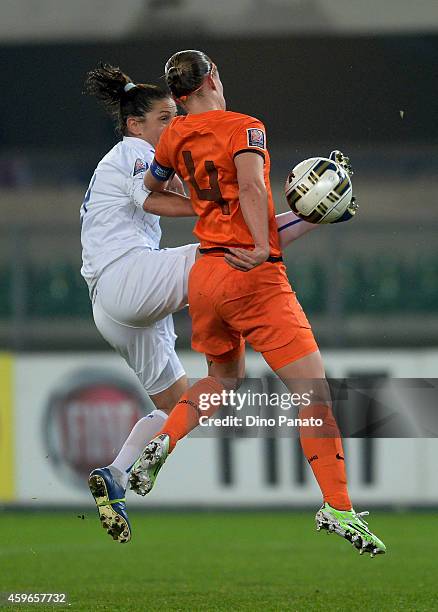 Patrizia Panico of Italy compertes with Mandy Van de Berg of Netherlands during the FIFA Women's World Cup Qualifier match between Italy and...