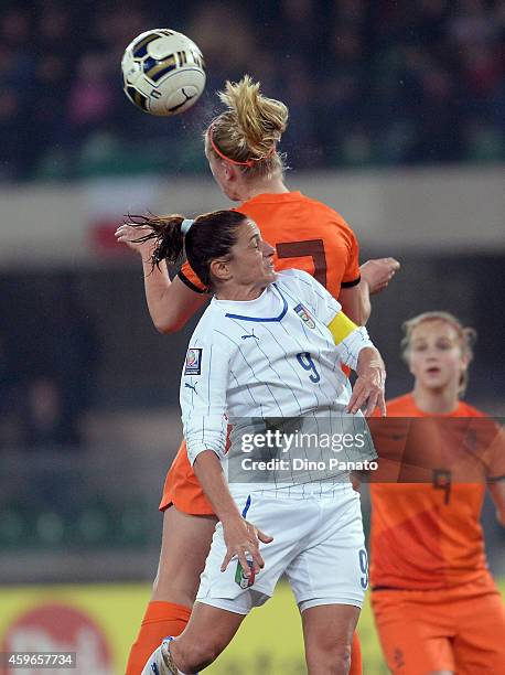 Patrizia Panico of Italy compertes with Manon Melis of Netherlands during the FIFA Women's World Cup Qualifier match between Italy and Netherlands at...