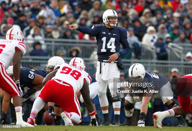 Christian Hackenberg of the Penn State Nittany Lions directs the offense to pass against the Nebraska Cornhuskers during the game on November 23,...