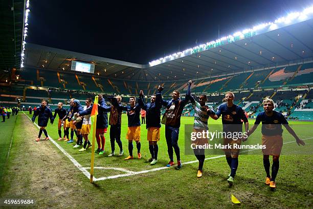 The FC Salzburg team celebrates in front of their fans after the final whistle during the UEFA Europa League group D match between Celtic FC and FC...