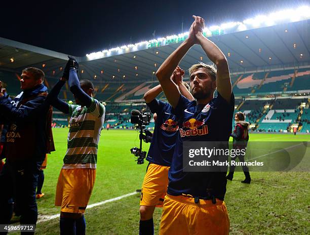 The FC Salzburg team celebrates in front of their fans after the final whistle during the UEFA Europa League group D match between Celtic FC and FC...