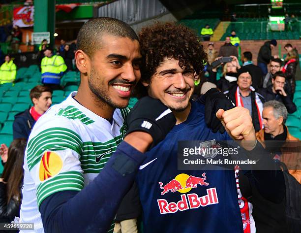Andre Ramalho and Alan of FC Salzburg celebrate winning the group in front of their fans after the final whistle during the UEFA Europa League group...