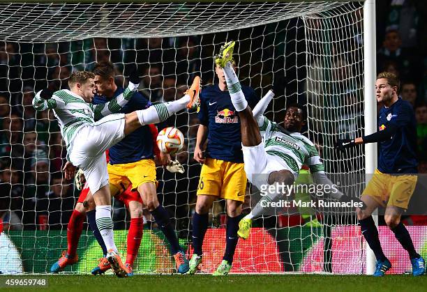 Efi Ambrose and Kris Commons of Celtic go for the same ball during the UEFA Europa League group D match between Celtic FC and FC Salzburg at Celtic...