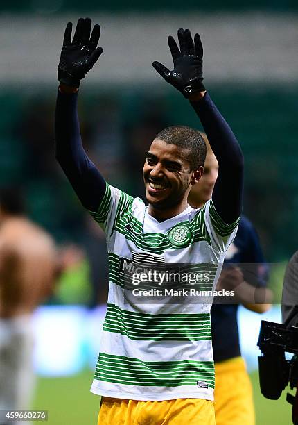 Alan of FC Salzburg celebrates winning the group with the traveling fans after the final whistle during the UEFA Europa League group D match between...