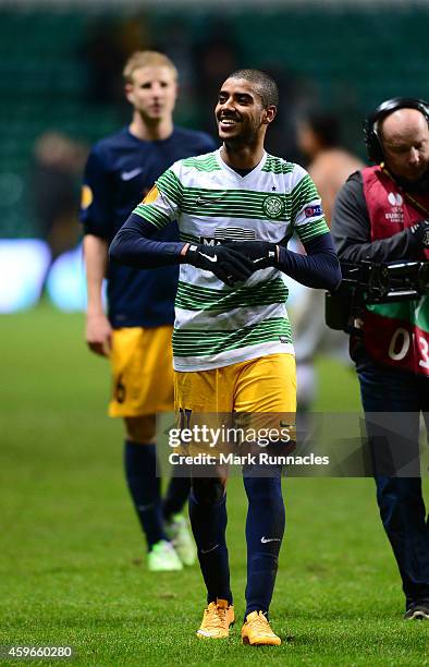 Alan of FC Salzburg celebrates winning the group with the traveling fans after the final whistle during the UEFA Europa League group D match between...