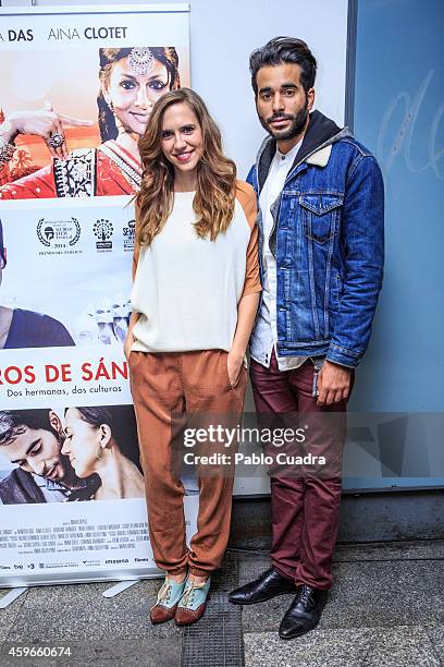 Aina Clotet and Naby Dakhli pose during a photocall to present 'Rastos de Sandalo' at Golem cinema on November 27, 2014 in Madrid, Spain.