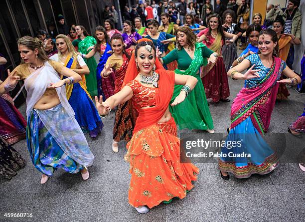 Dancers perform a Bollywood routine to present 'Rastos de Sandalo' at Golem cinema on November 27, 2014 in Madrid, Spain.