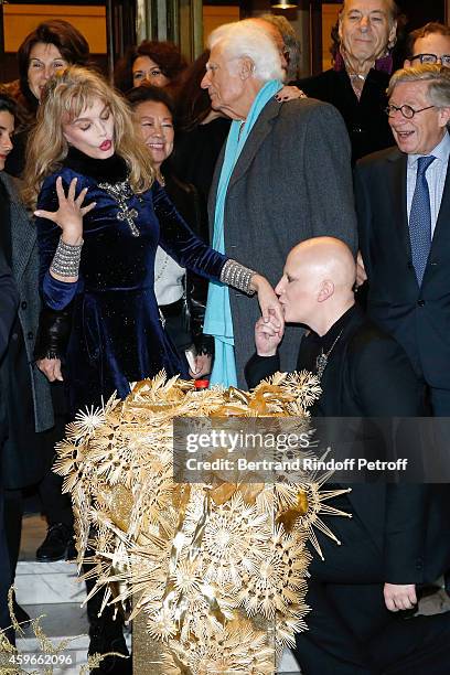 Actress Arielle Dombasle and Artist Ali Mahdavi attend Arielle Dombasle Launches Christmas Montaigne Avenue Illuminations during the 19th Edition of...