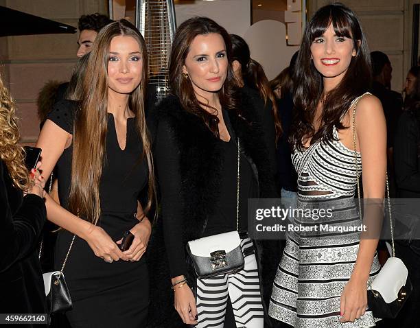 Lara Leito, Monica Tomas and Alba Albadalejo attend the 'Furla' store opening on November 27, 2014 in Barcelona, Spain.