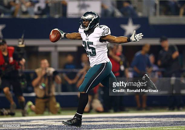 LeSean McCoy of the Philadelphia Eagles runs for a touchdown against the Dallas Cowboys in the second half at AT&T Stadium on November 27, 2014 in...
