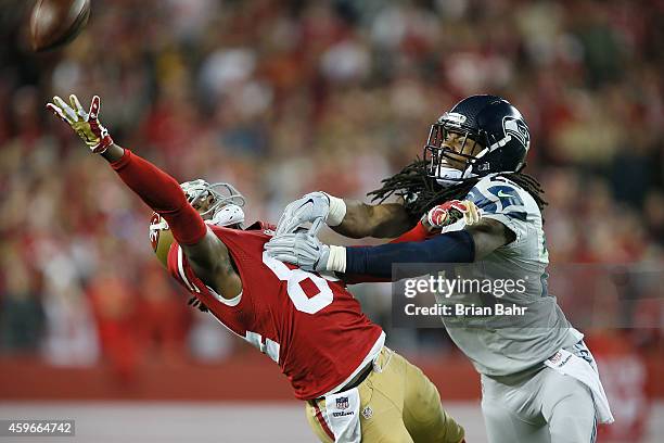 Richard Sherman of the Seattle Seahawks covers Brandon Lloyd of the San Francisco 49ers during an incomplete pass in the first quarter at Levi's...