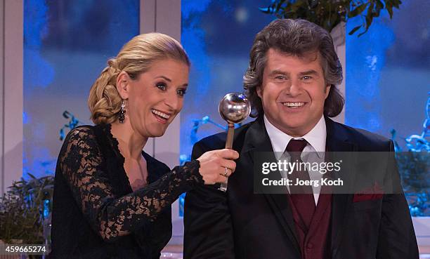 Stefanie Hertel and Andy Borg attend the taping of the TV show 'Heiligabend mit Carmen Nebel' on November 27, 2014 in Munich, Germany.