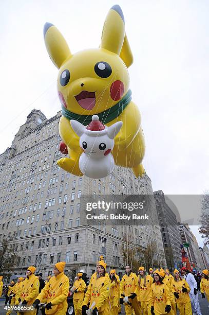 The Pikachu balloon floats at the 88th Annual Macys Thanksgiving Day Parade at on November 27, 2014 in New York, New York.