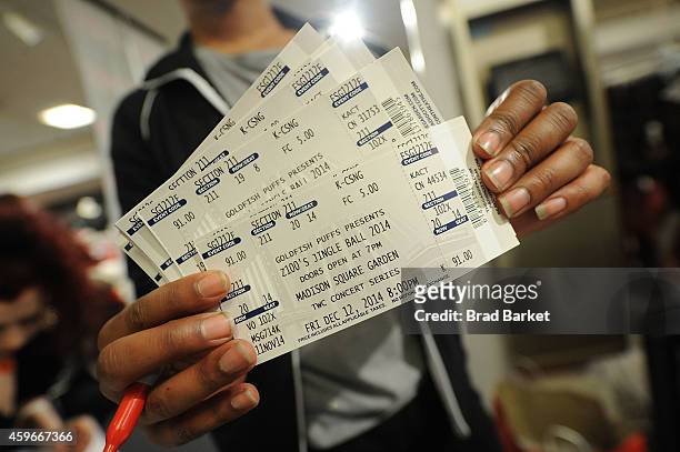 Jingle Ball tickets are seen at Macy's Herald Square New York Jingle Ball Ticket Giveaway at Macy's Herald Square on November 27, 2014 in New York...