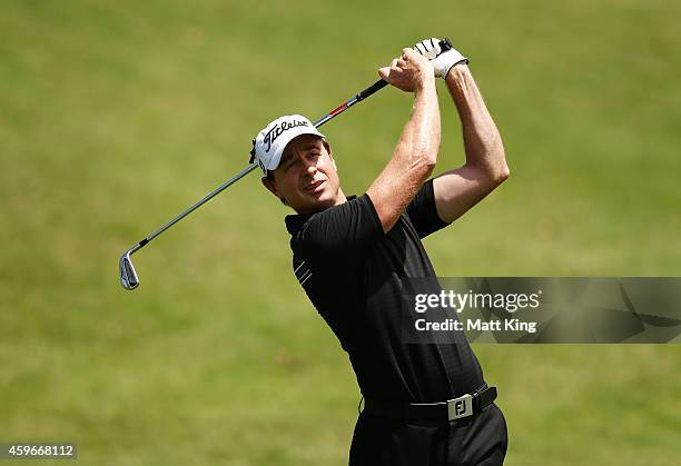 Brett Rumford of Australia plays a fairway shot on the 8th hole during day two of the Australian Open at The Australian Golf Course on November 28,...