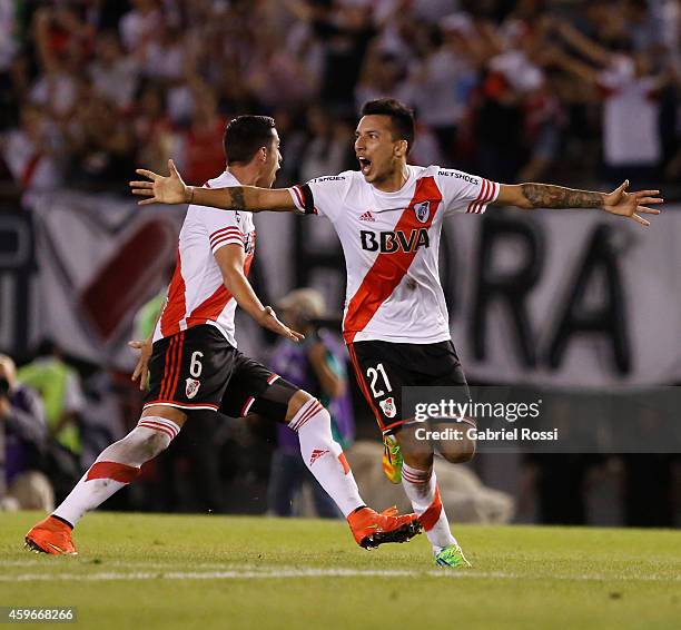 Ramiro Funes Mori and Leonel Vangioni of River Plate celebrate after winning a second leg semifinal match between River Plate and Boca Juniors as...