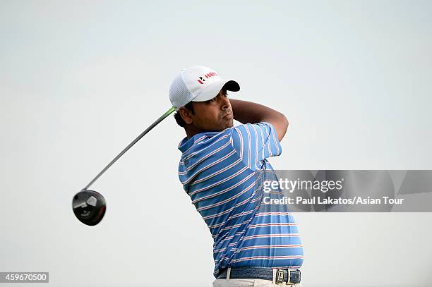 Anirban Lahiri of India plays a shot during round two of the King's Cup at Singha Park Khon Kaen Golf Club on November 28, 2014 in Khon Kaen,...