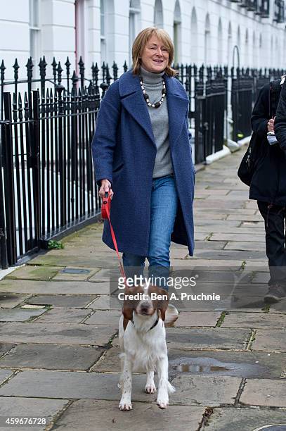 Dr Sharon Bennett, wife of Andrew Mitchell, leaves their home on November 28, 2014 in London, England. A judge ruled yesterday that Andrew Mitchell...