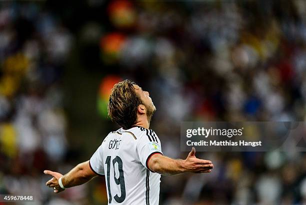 Mario Goetze of Germany celebrates scoring his team's first goal during the 2014 FIFA World Cup Brazil Final match between Germany and Argentina at...