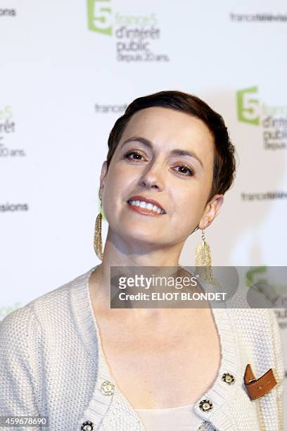 French TV host Sophie Jovillard poses on November 27, 2014 in Paris, during the celebrations of the 20th anniversary of French public television...