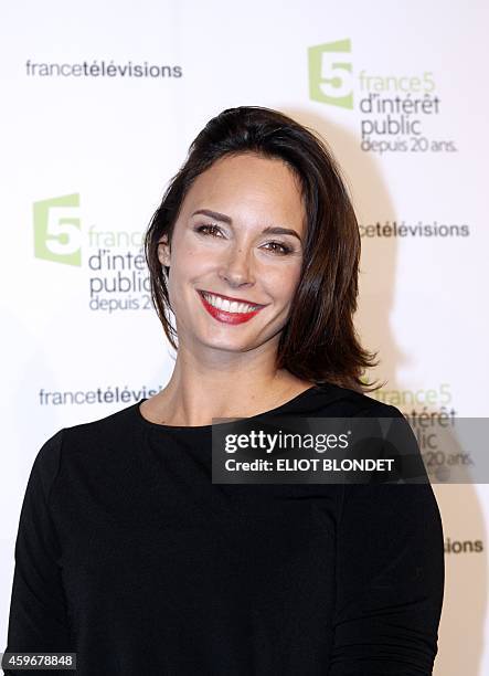 French TV host Julia Vignali poses on November 27, 2014 in Paris, during the celebrations of the 20th anniversary of French public television channel...