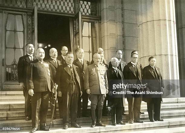 Prime Minister Hideki Tojo and his cabinet members pose for photographs at Tojo's official residence on October 18, 1941 in Tokyo, Japan.