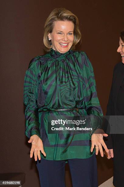 Queen Mathilde of Belgium visits the Medical Center for Assistance to the Victims Excision at CHU Saint Pierre on November 28, 2014 in Brussel,...