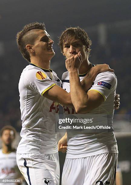 Benjamin Stambouli of Tottenham Hotspur celebrates scoring the winning goal with Erik Lamela during the UEFA Europa League match between Tottenham...