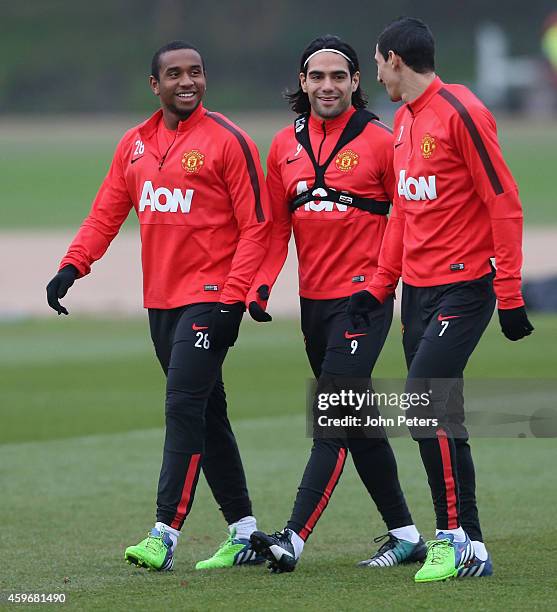 Anderson, Radamel Falcao and Angel di Maria of Manchester United in action during a first team training session at Aon Training Complex on November...